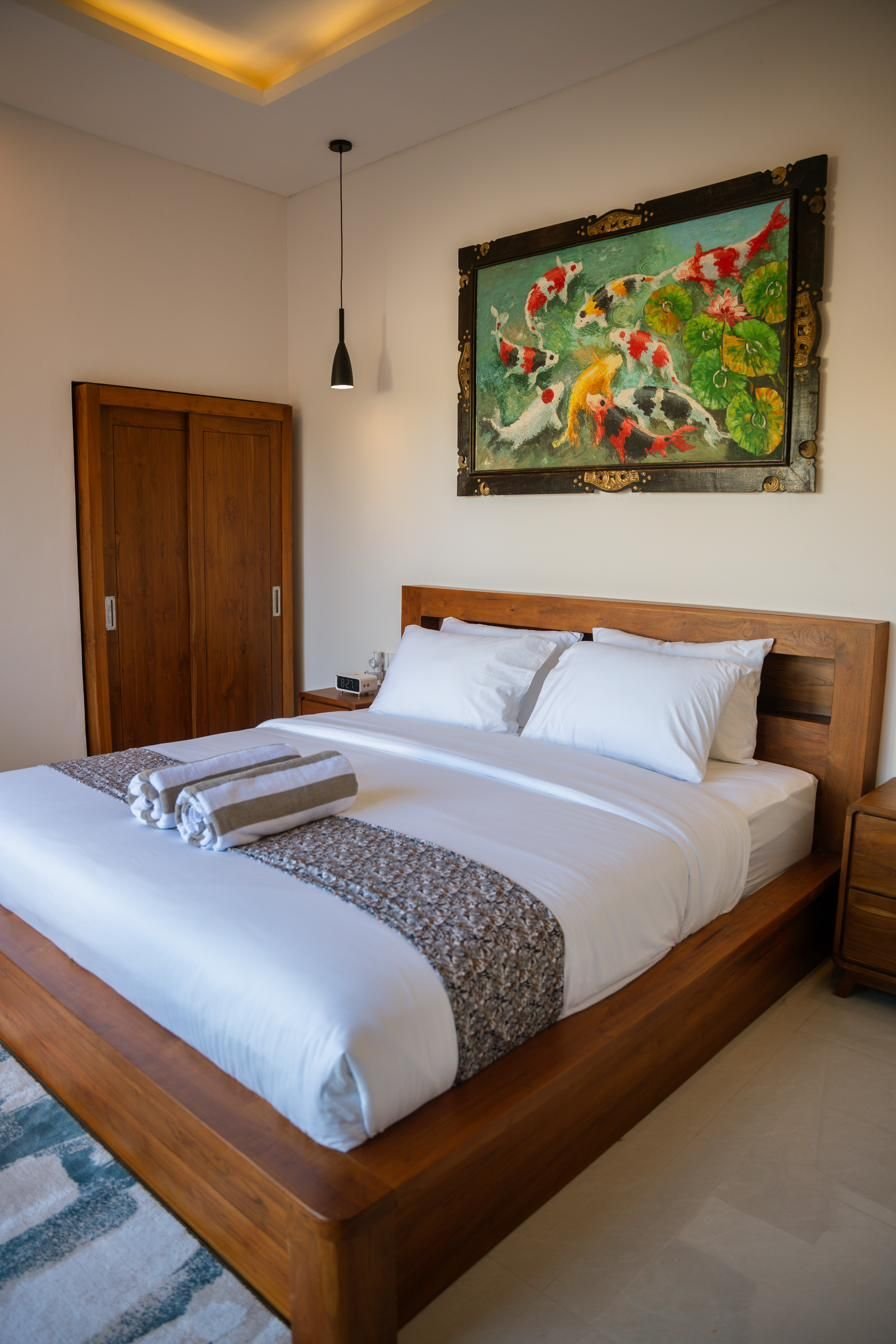 Queen bedroom with Balinese koi painting