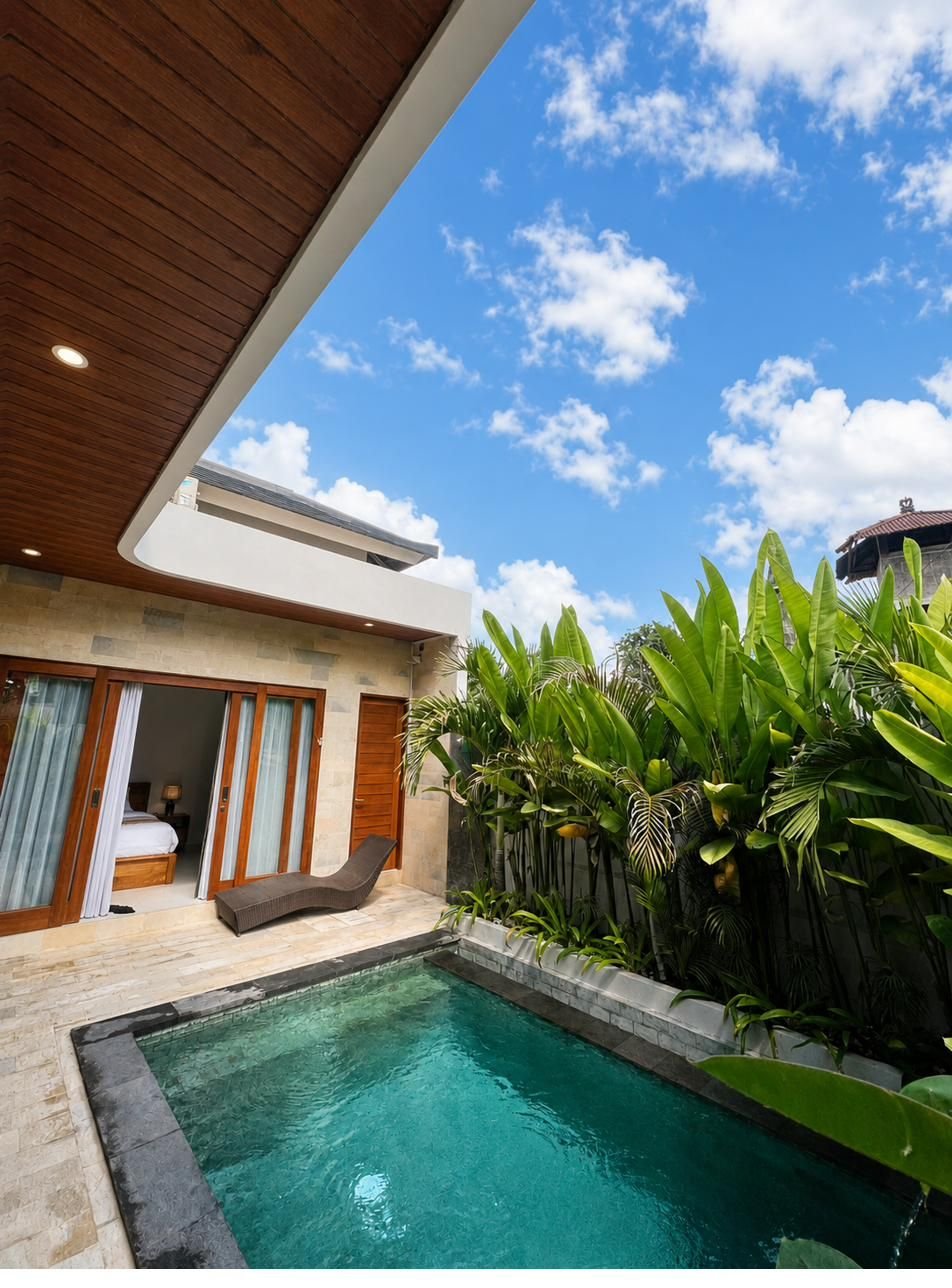 Tropical private pool surrounded by palms at Niva Sanctuary Ubud
